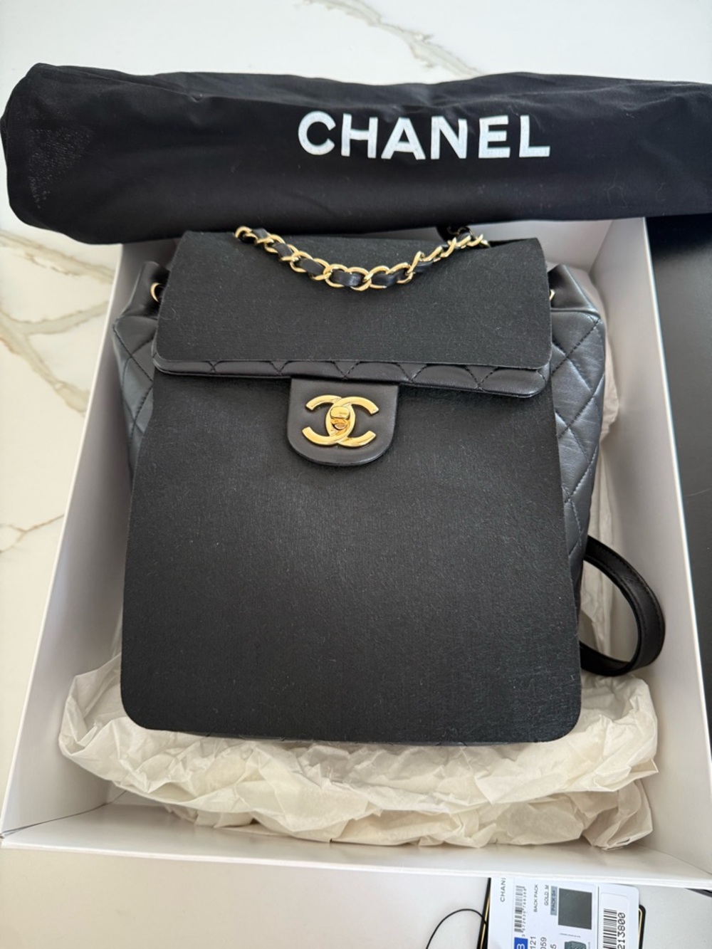 CHANEL Black Quilted Lambskin Backpack with Gold Chain - Picture 9 of 11
